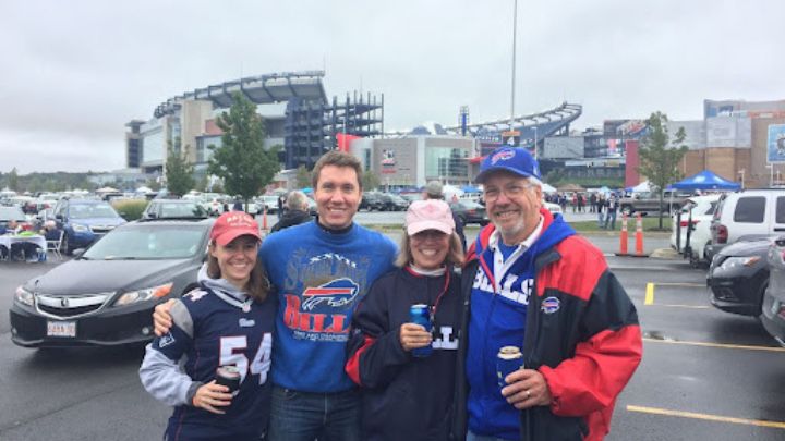 family posed tailing at buffalo bills game