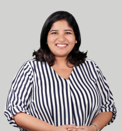 headshot of woman in striped shirt